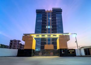 a tall building with a lot of windows at Hotel Astravista in Jaipur
