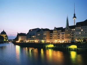 a view of a city with a river and buildings at greet Berlin Alexanderplatz in Berlin