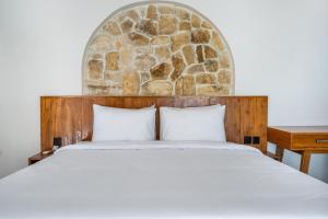 Katil atau katil-katil dalam bilik di Kuta Beach Villas by Great Bali Villas +154 gambar