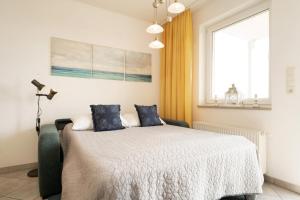 Ένα ή περισσότερα κρεβάτια σε δωμάτιο στο Krug I