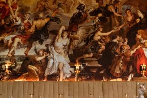 a painting of a group of people on a ceiling at Hôtel Royal Beaulaincourt in Béthune