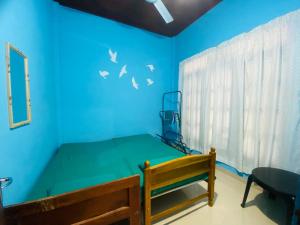 Ένα ή περισσότερα κρεβάτια σε δωμάτιο στο Sri pa Resort +18 φωτογραφίες