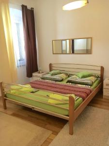 a bedroom with two beds in a room at Ana Apartment in Pula