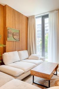 Un lugar para sentarse en 2BR Tree House in AlJada by Arada - 3WC- Workstation