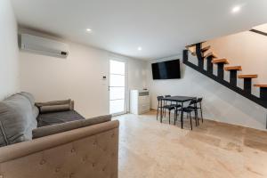 Posezení v ubytování Canto Cigalo Duplex 13