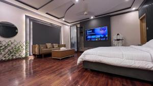 TV a/nebo společenská místnost v ubytování Horizon inn hotel