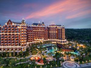an aerial view of a hotel and a resort at Mövenpick Resort Phan Thiet in Phan Thiet