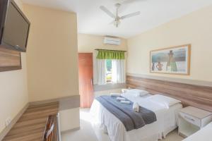 Et værelse på Hotel Camburi Praia