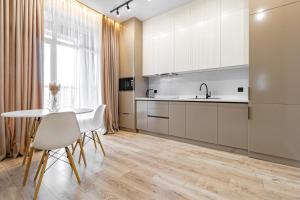 Η κουζίνα ή μικρή κουζίνα στο Apartments