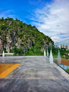 a view from the top of a building with a mountain at NO.9 Alley Yuchen Res Dence in Guilin