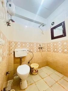 Koupelna v ubytování Hotel Pub G - Mayur Vihar