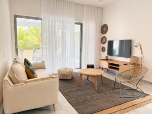 Μια τηλεόραση ή/και κέντρο ψυχαγωγίας στο Ki Resort by LOV Mauritius