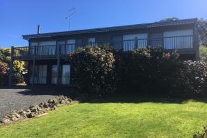 a large house with a yard in front of it at One95 Family Beach House in Anglesea
