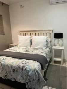 Ένα ή περισσότερα κρεβάτια σε δωμάτιο στο Hillcrest Haven