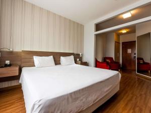 Ένα ή περισσότερα κρεβάτια σε δωμάτιο στο Ibis Styles Campinas Alphaville +129 φωτογραφίες