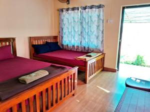 Postel nebo postele na pokoji v ubytování COZINN B128 at Gokarna Beach