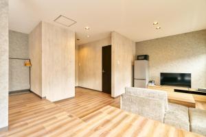 TV a/nebo společenská místnost v ubytování TOMORI Kyoto- Cozy for Couples, Perfect for friends & Families + 45 fotografií