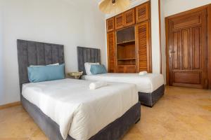 Postel nebo postele na pokoji v ubytování 3BR Apartment in Prestigious Hay Riad