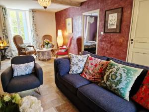 Posezení v ubytování L'Orée de la cité