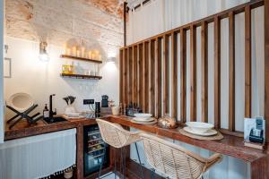 Η κουζίνα ή μικρή κουζίνα στο Archè Luxury private Spa +15 φωτογραφίες