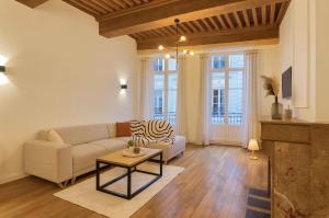 Ruang duduk di La parenthèse mâconnaise d Excellence Conciergerie