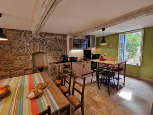 Posezení v ubytování L'Orée de la cité