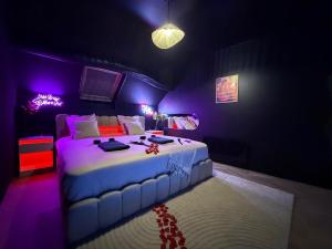 En eller flere senge i et værelse på Velvet room balneo