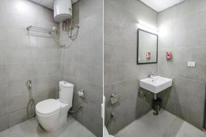 ニューデリーにあるGolden World Hotelのバスルーム(トイレ、洗面台付)の写真2枚