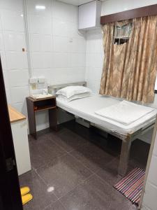 Ένα ή περισσότερα κρεβάτια σε δωμάτιο στο Angel paradise guest house