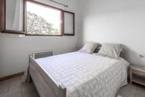 Postel nebo postele na pokoji v ubytování La Petite Étoile - Maison 2 Chambres à Quillan