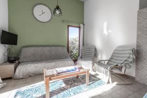 Posezení v ubytování La Petite Étoile - Maison 2 Chambres à Quillan