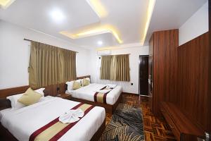 Postel nebo postele na pokoji v ubytování Family Apartment