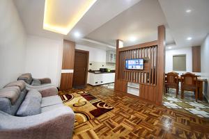 Kuchyň nebo kuchyňský kout v ubytování Family Apartment