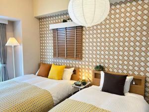 Katil atau katil-katil dalam bilik di simasima-stayサン203 高松駅徒歩5分