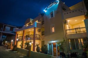 a night view of a building at Vrokastro Apartments in Istro