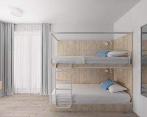 Кровать или кровати в номере Fairschlafen Boutique Hostel Zimmer 0-12