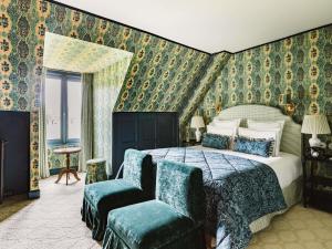 Postel nebo postele na pokoji v ubytování Abbaye Des Vaux De Cernay