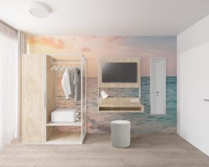 Телевизор и/или развлекательный центр в Fairschlafen Boutique Hostel Zimmer 1-06 mit Balkon