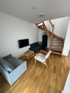 Posezení v ubytování F4 - 2 Zimmer-Wohnung