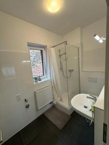 Koupelna v ubytování F4 - 2 Zimmer-Wohnung