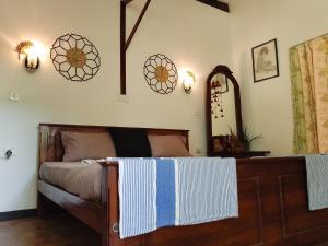Postel nebo postele na pokoji v ubytování Ranga Villa