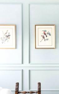 three framed pictures of horses on a wall at Florès Boutique Hotel in Zwolle