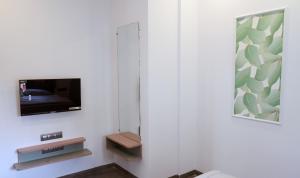 TV a/nebo společenská místnost v ubytování Aqua Nova Resort