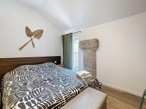 Postel nebo postele na pokoji v ubytování Grande villa de charme proche de la mer