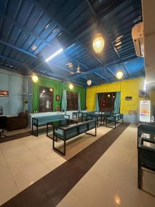 a room with several ping pong tables in it at Blue Brick in Jodhpur