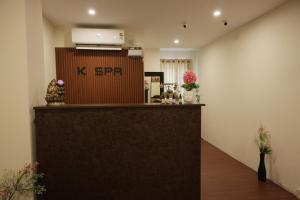 a bar in a room with a counter at Serene Stays in Chennai