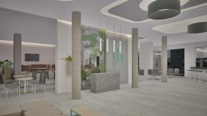 a rendering of a living room with tables and chairs at Lymberia Hotel in Faliraki