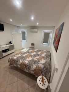 a bedroom with a bed and a table in it at Il nido delle rondini in Comacchio