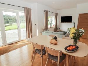 TV a/nebo společenská místnost v ubytování The Lodge