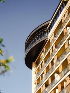 a tall building with a dome on top of it at Bohemia Suites & Spa - Adults Only in Playa del Ingles